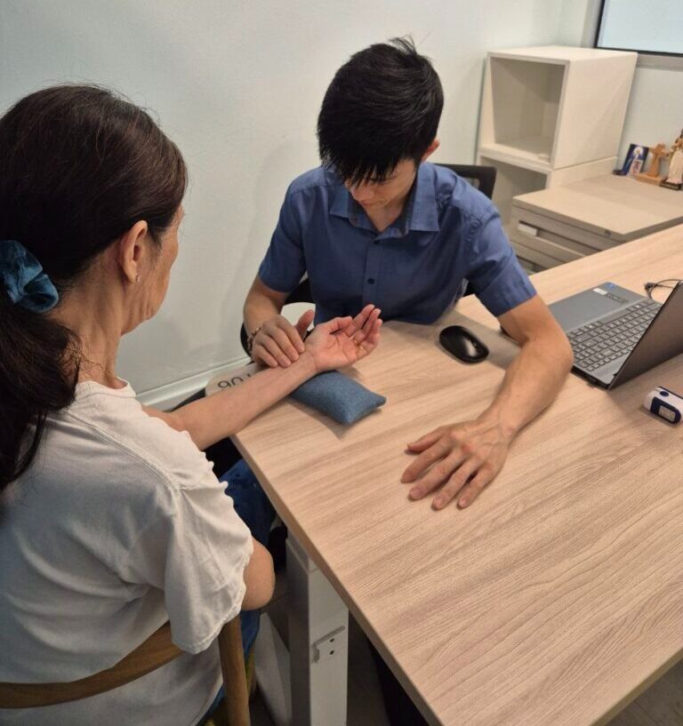 John Tang in consultation